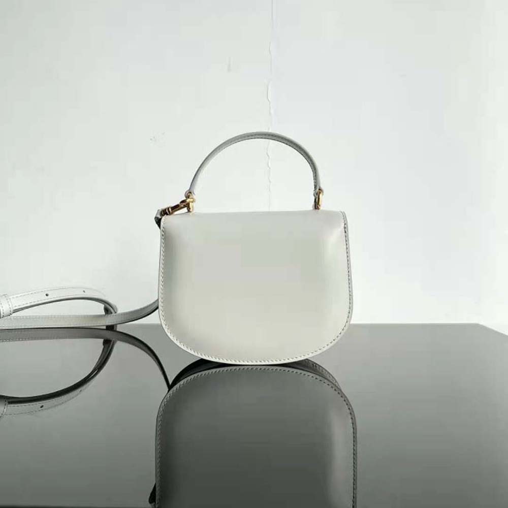 Side angle showing silhouette and strap of Celine Women Mini Besace Triomphe