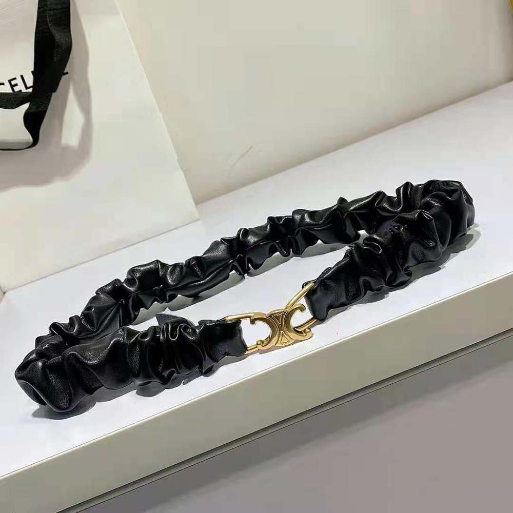 Close-up of gold Triomphe buckle on Celine Women Small Triomphe Scrunchy Belt