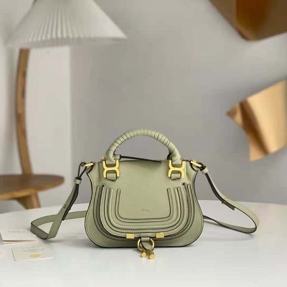 Close-up of gold-tone clasp and signature leather texture on Marcie Mini Double Carry Bag-Green