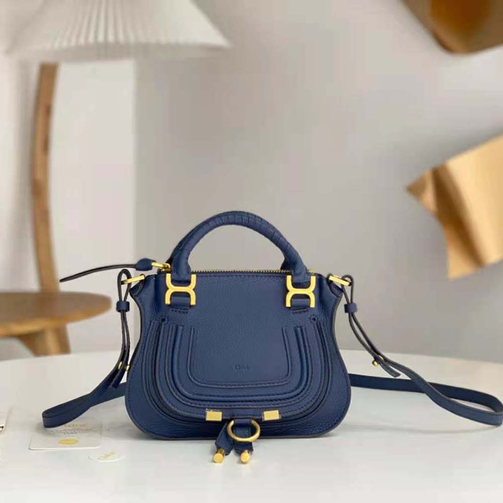 Close-up of gold-tone closure and navy leather on Chloe Women Marcie Mini Double Carry Bag-Navy
