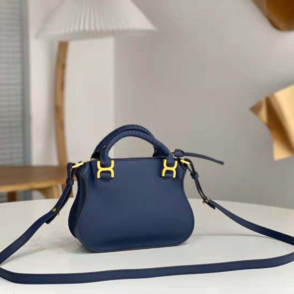 Side angle showing structured silhouette of Chloe Women Marcie Mini Double Carry Bag-Navy