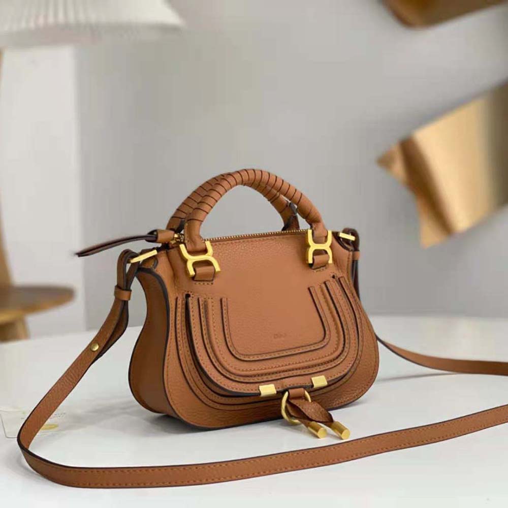 Side profile highlighting curved silhouette of Chloe Women Marcie Mini Double Carry Bag-Tan