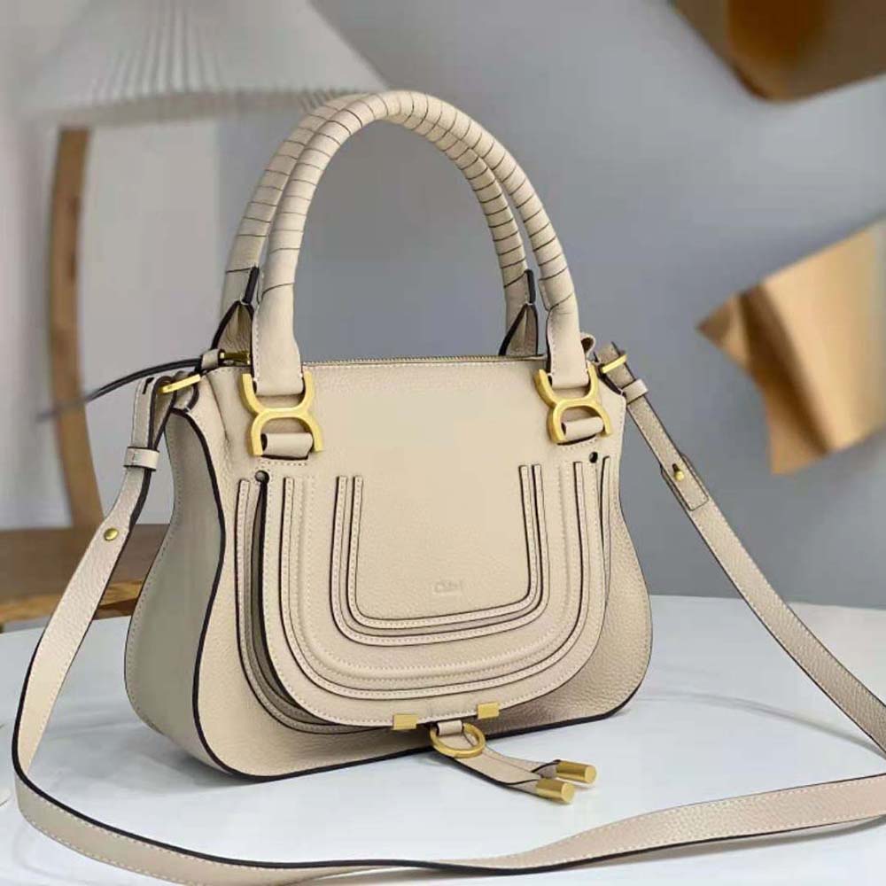Side angle showing curved top handle detail on Chloe Women Marcie Small Double Carry Bag-Beige