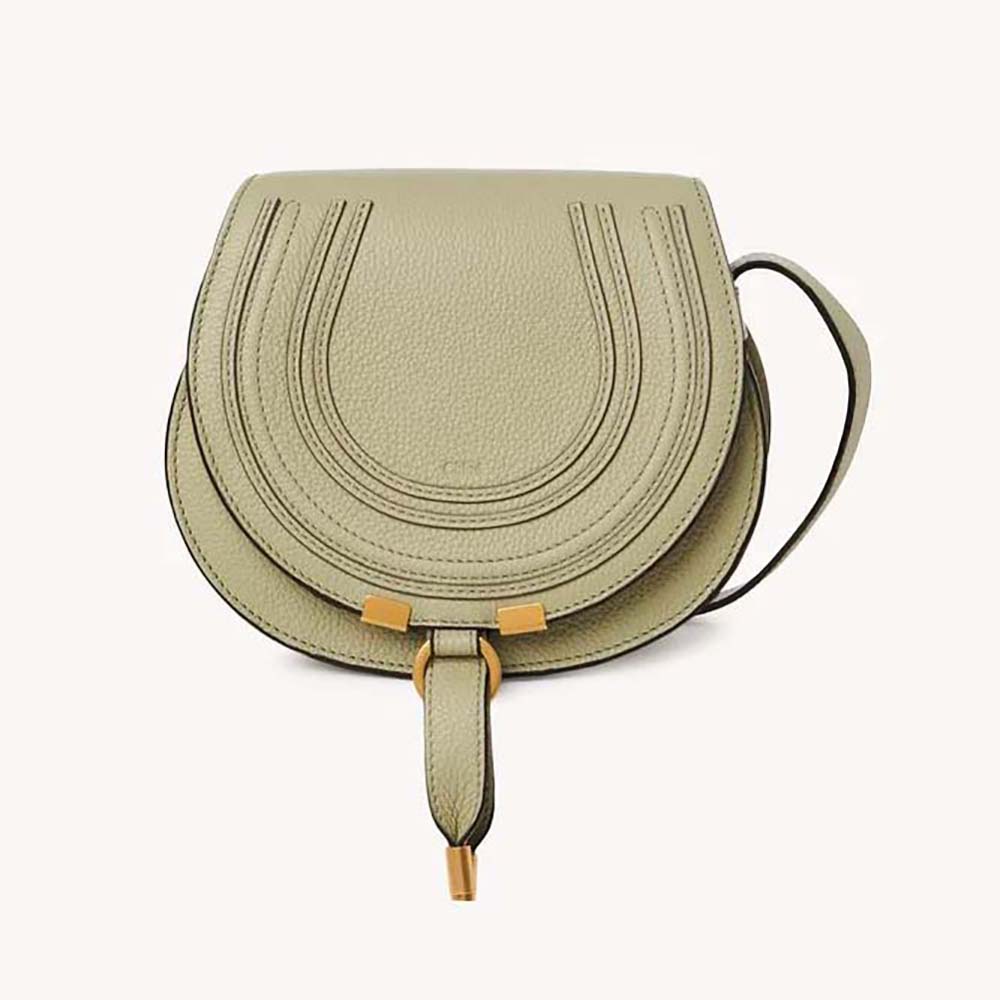 Front angle of Chloe Women Marcie Small Saddle Bag-Green showing braided trim