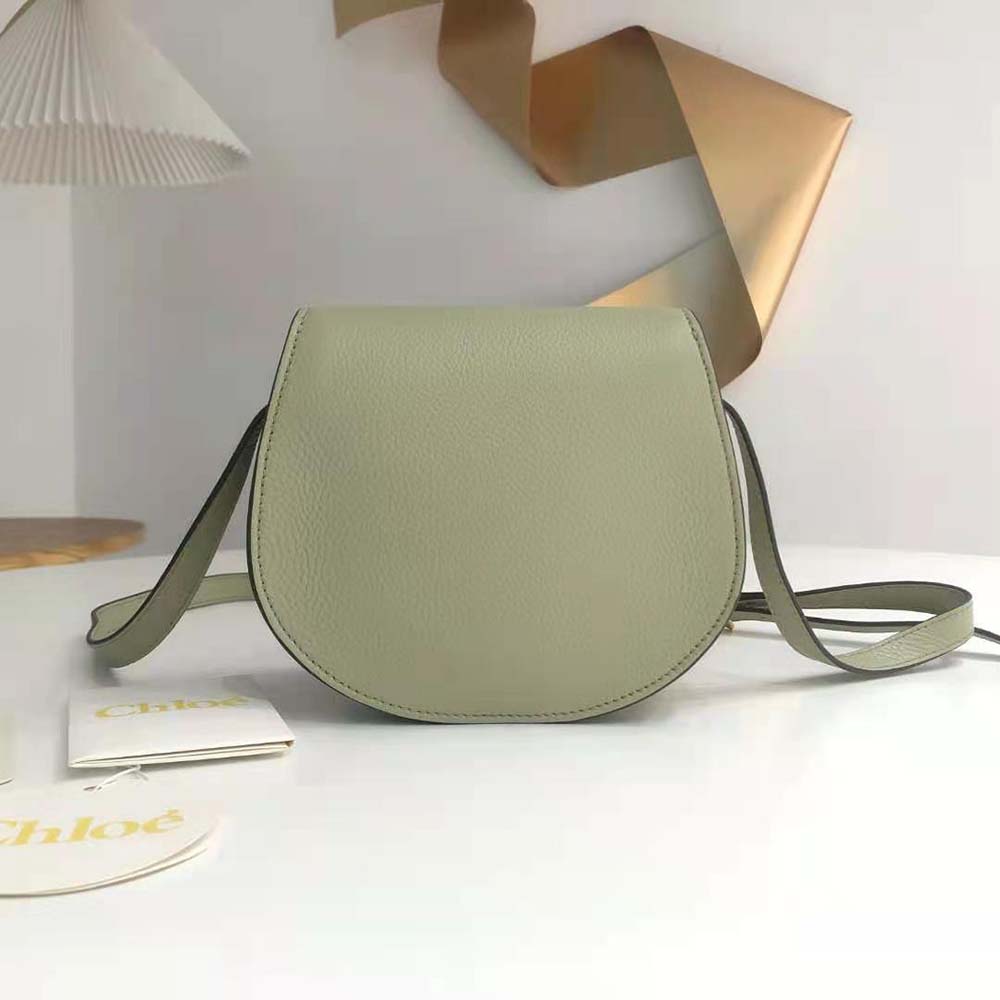 Side view highlighting compact silhouette of Chloe Women Marcie Small Saddle Bag-Green