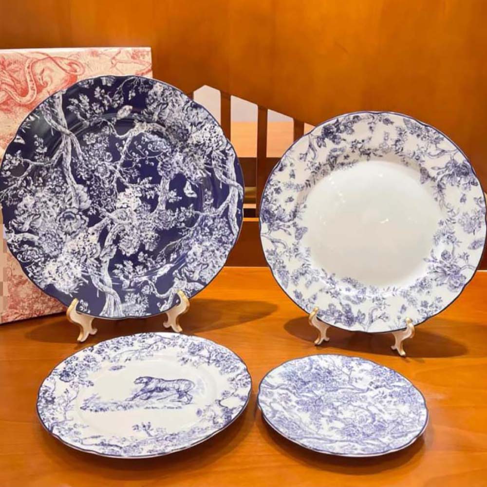 Close-up of detailed hydrangea motif on Dior decorative plate