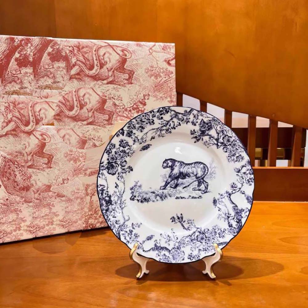 Close-up of blue tiger detail on Dior Unisex Dessert Plate Toile de Jouy