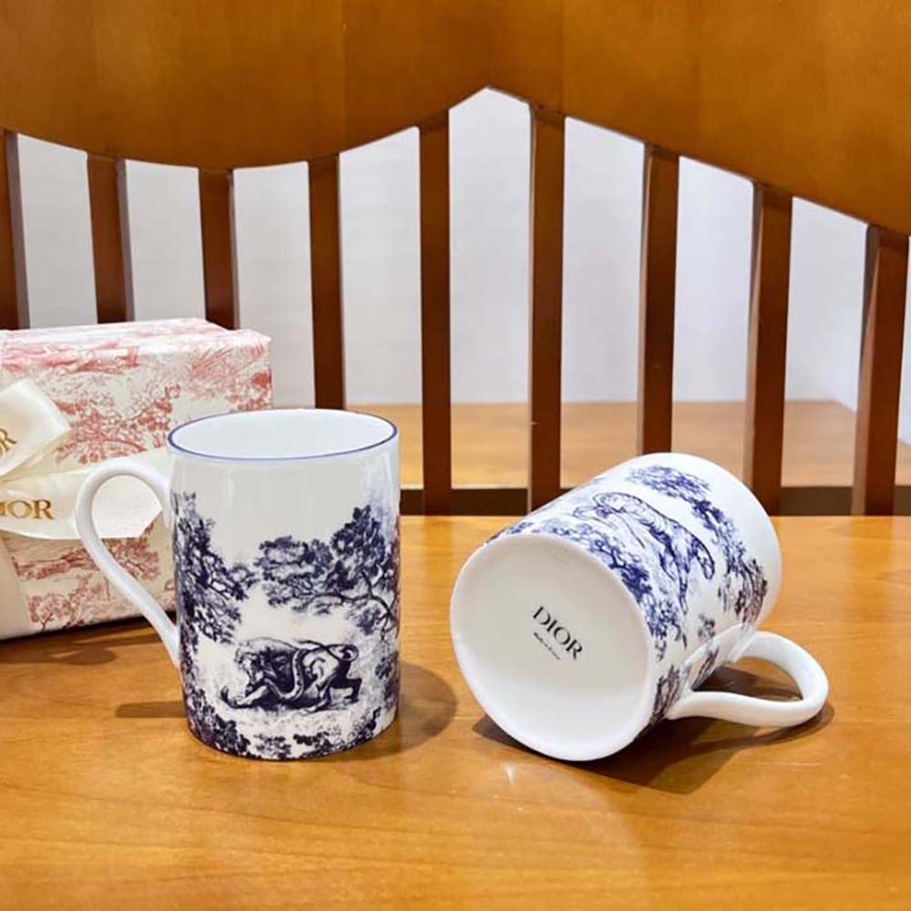 Close-up on signature blue Toile de Jouy pattern on Dior mug
