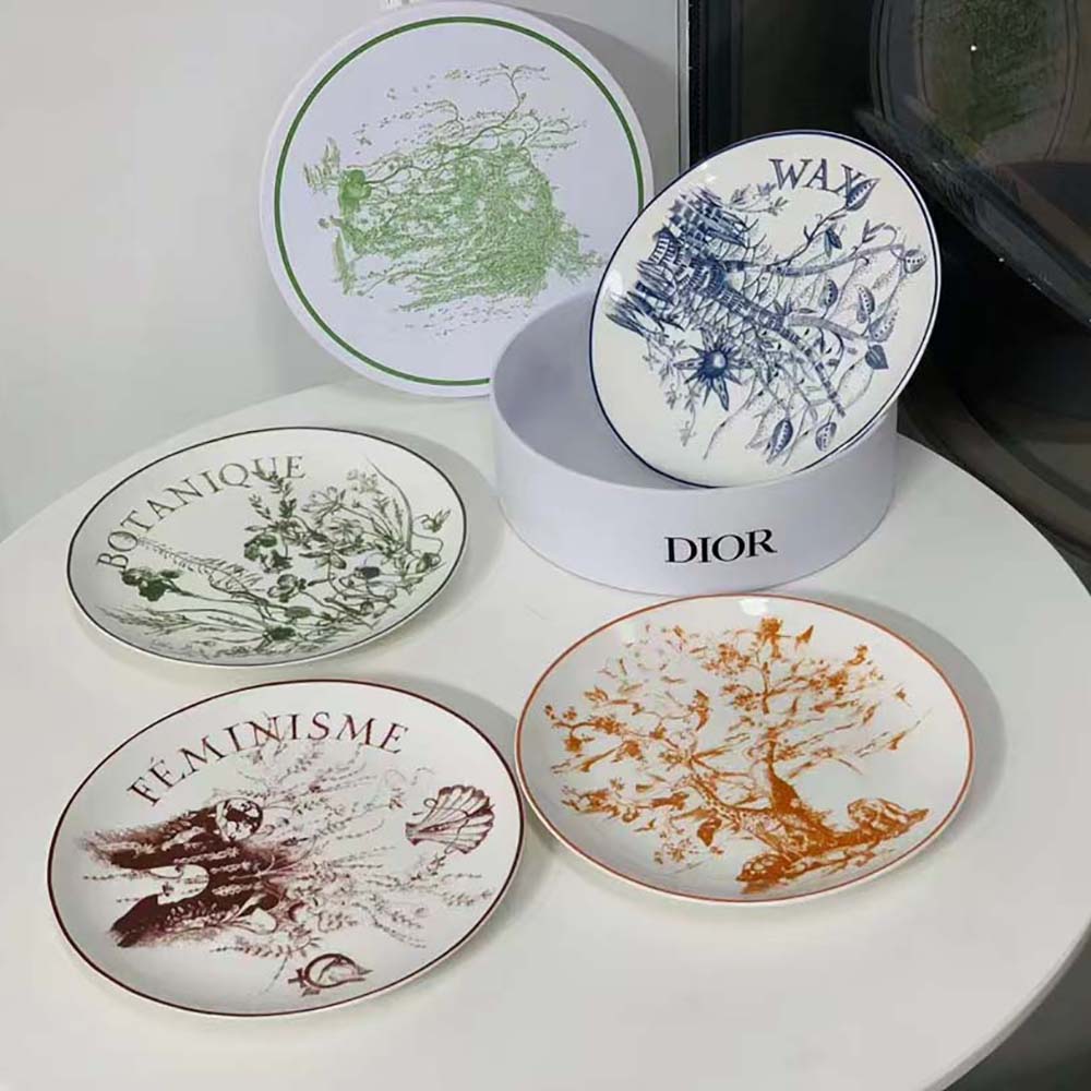 Stacked Dior Unisex Set of 4 Dinner Plates highlighting white porcelain finish