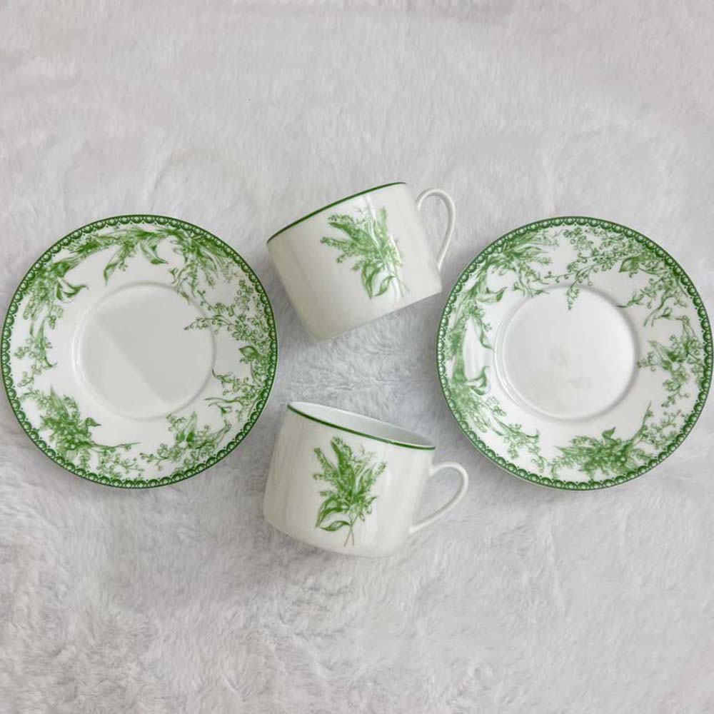 Side angle showing silver-tone closure on Dior Unisex Teacup Green