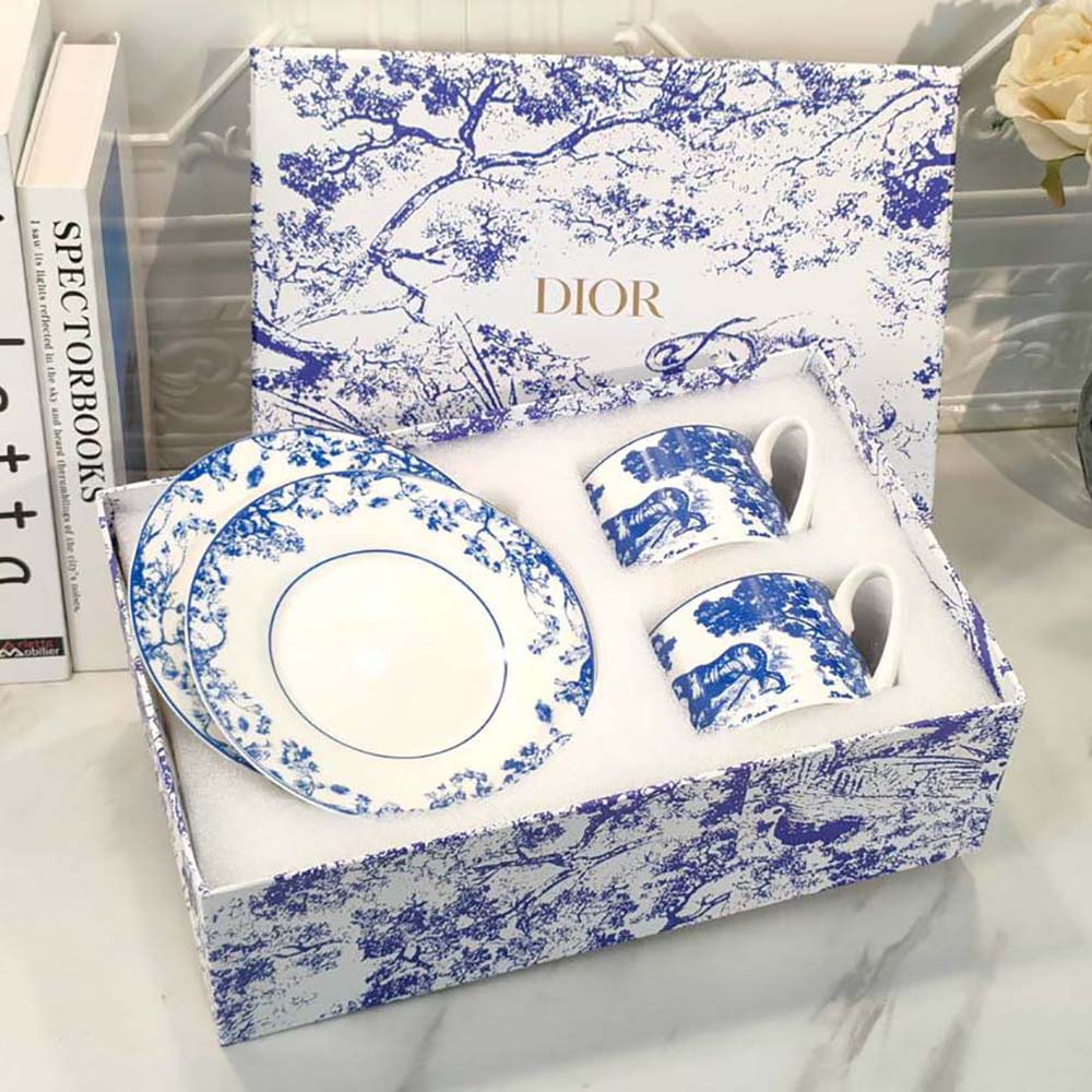 Close-up detail of blue Toile de Jouy design on Dior teacup saucer