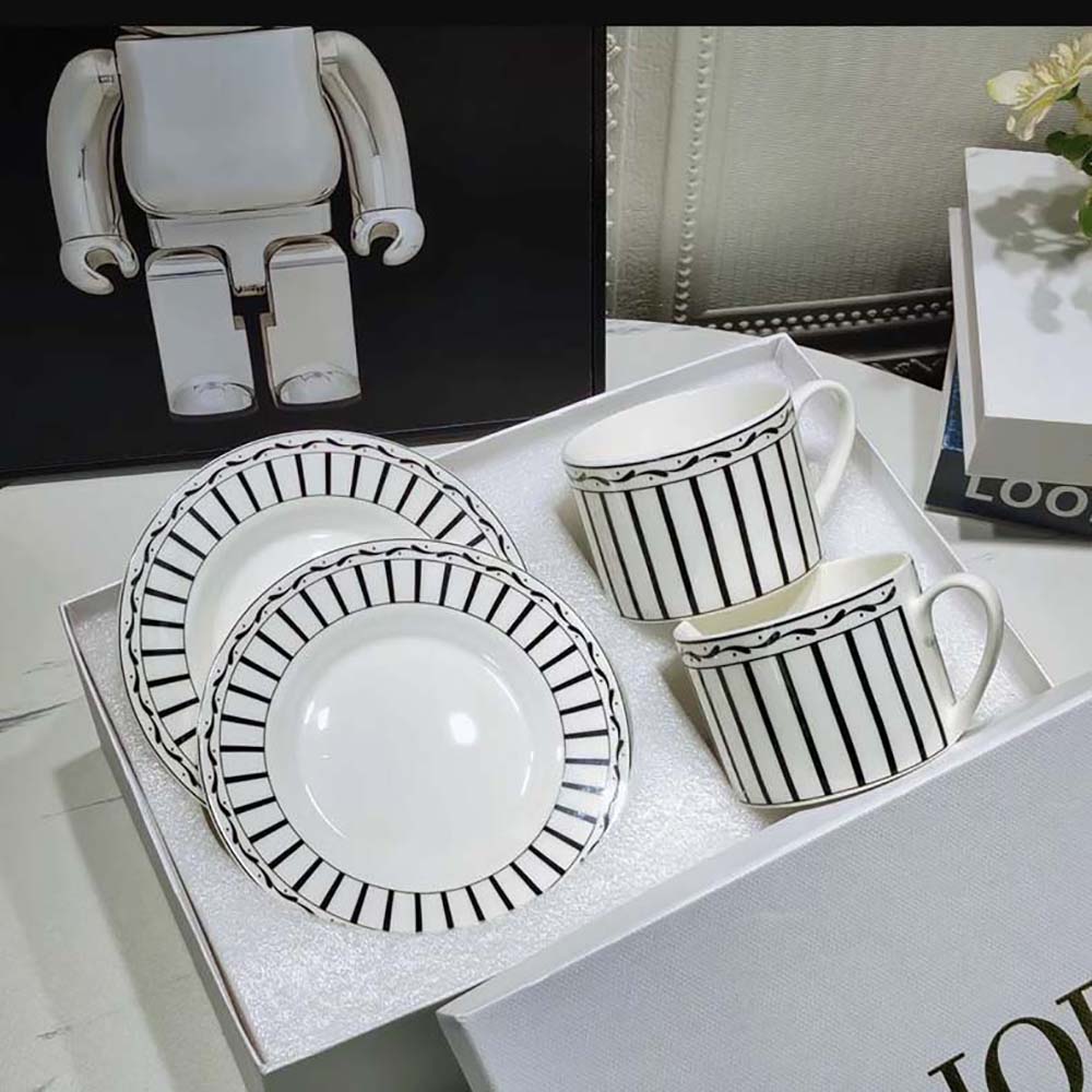 Side angle showing porcelain texture of Dior Unisex Teacup Saucer