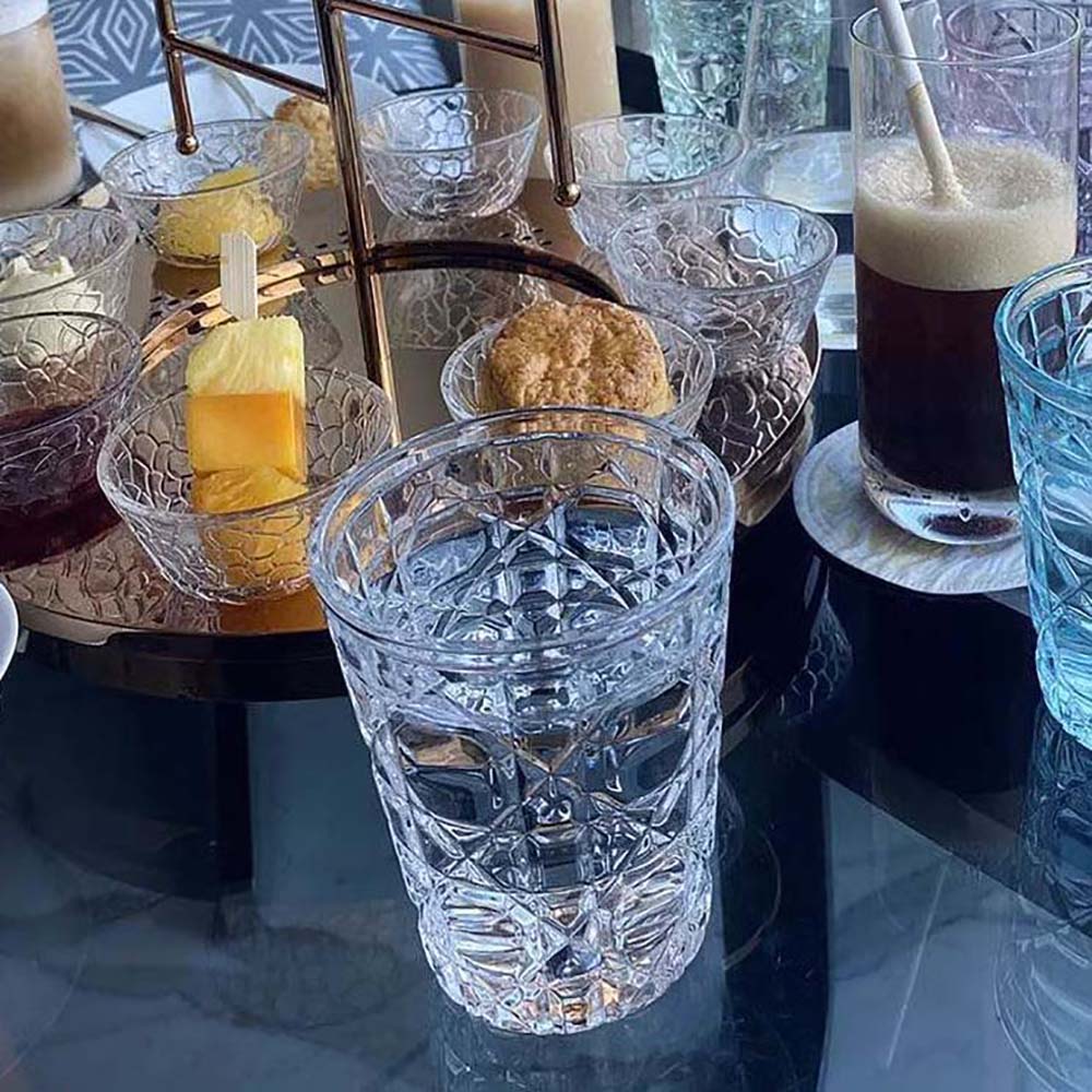 Angled shot of Dior Unisex Water Glass Transparent Cannage showing smooth finish