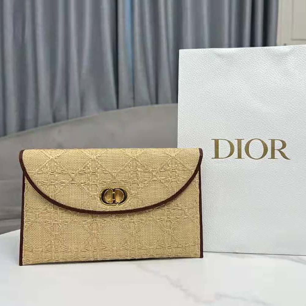 Close-up of natural Cannage raffia pattern on Dior pouch