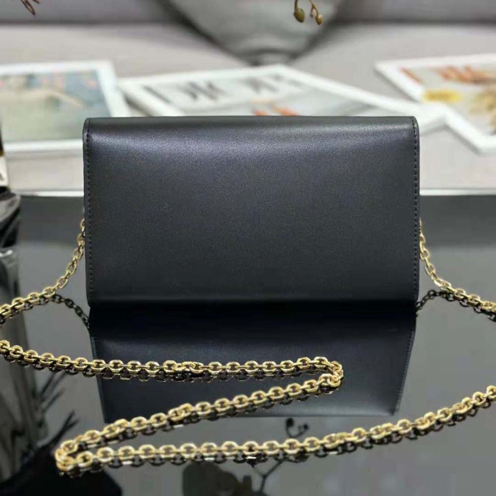 Side angle showing compact silhouette of Dior Women Bobby East-west Pouch with Chain