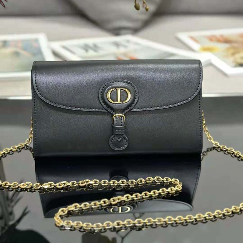 Close-up of silver chain and leather texture on Dior Women Bobby East-west Pouch