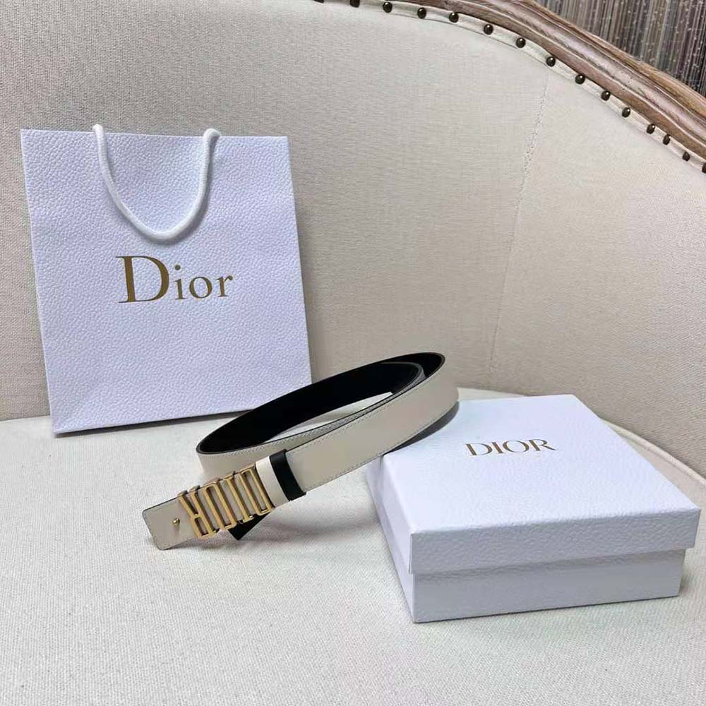 Side angle showing cognac and black leather on Dior D-Fence belt