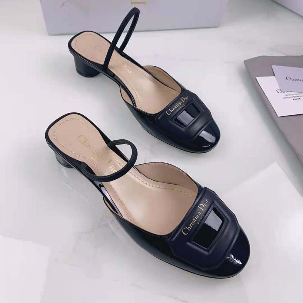 Close-up of silver Dior hardware on slingback pump
