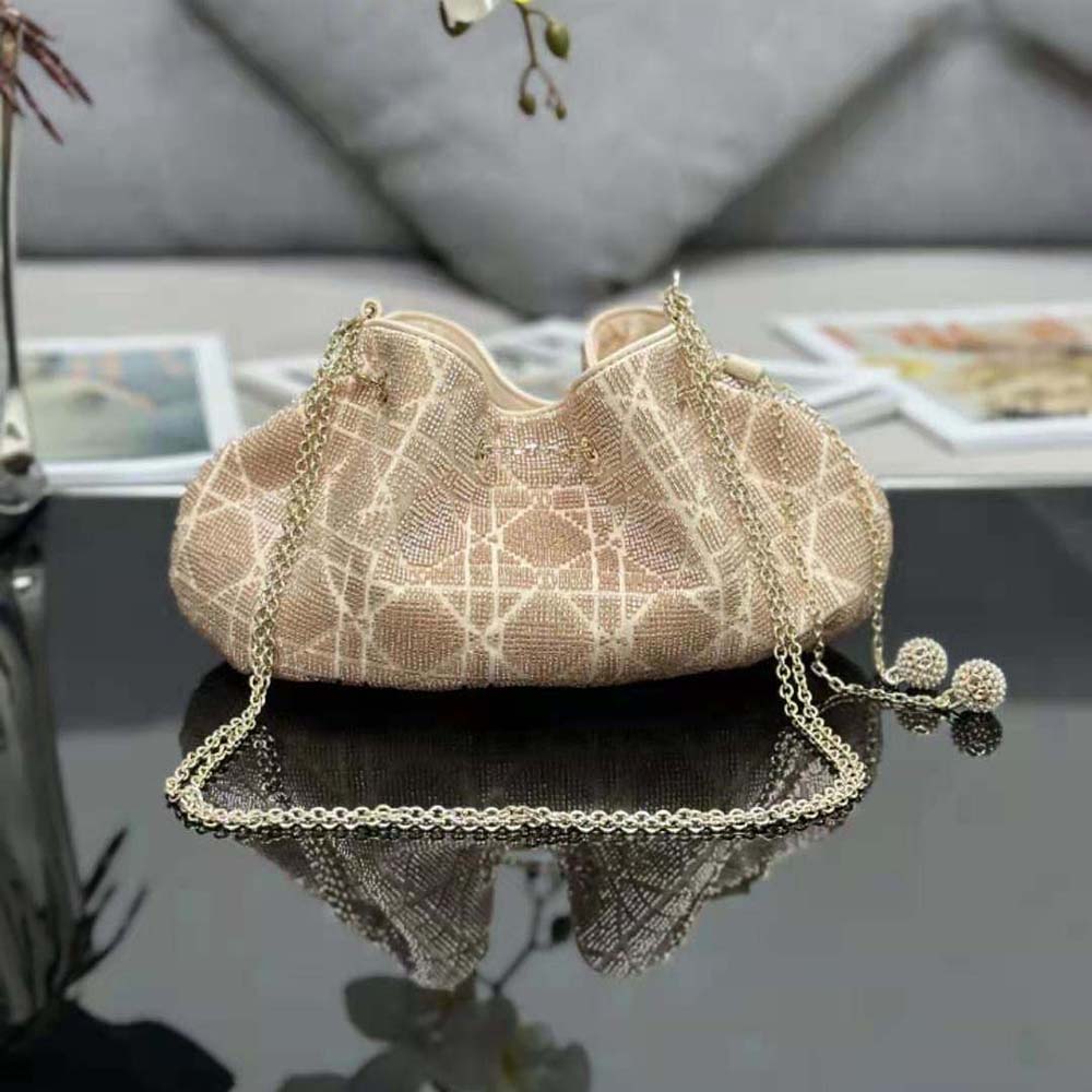 Close-up detail of bead embroidery on Dior Dream Bucket Bag beige cotton