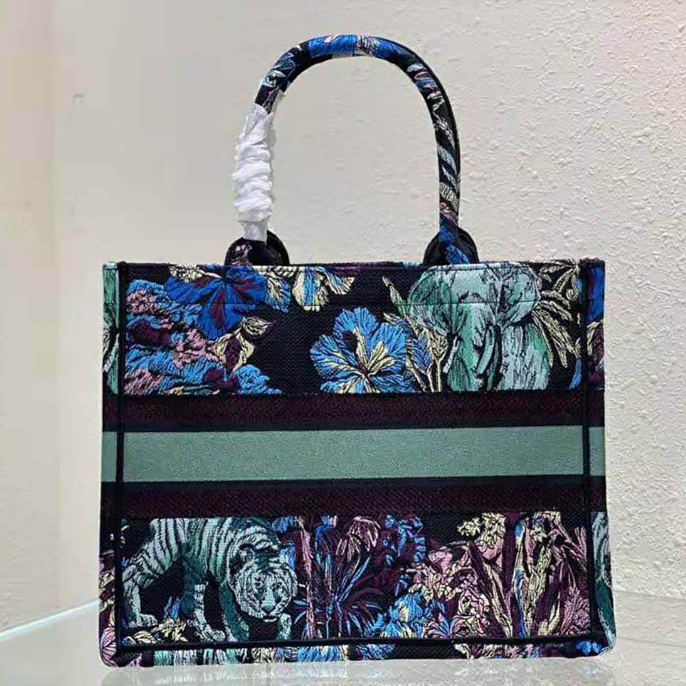 Side view showing silver hardware and zip closure on Dior Women Medium Dior Book Tote