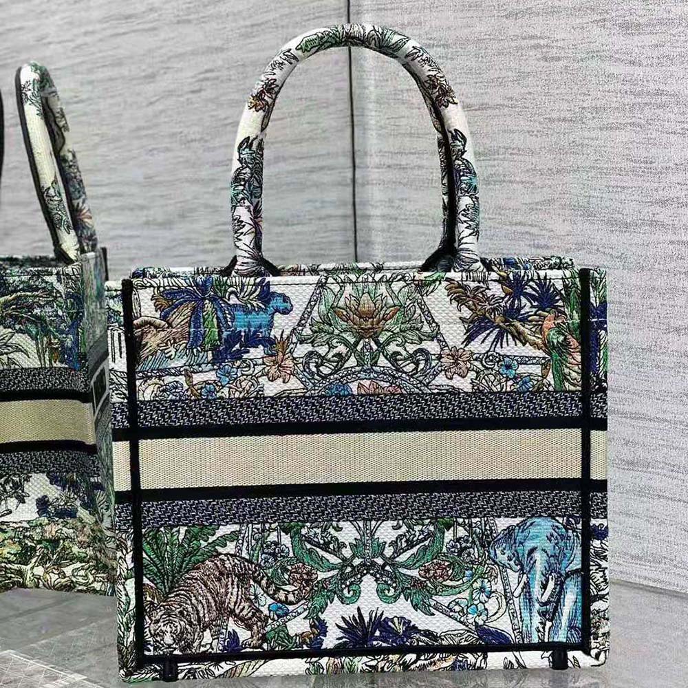 Side angle showing green accents on Dior Women Medium Dior Book Tote White Multicolor Étoile de Voyage Embroidery