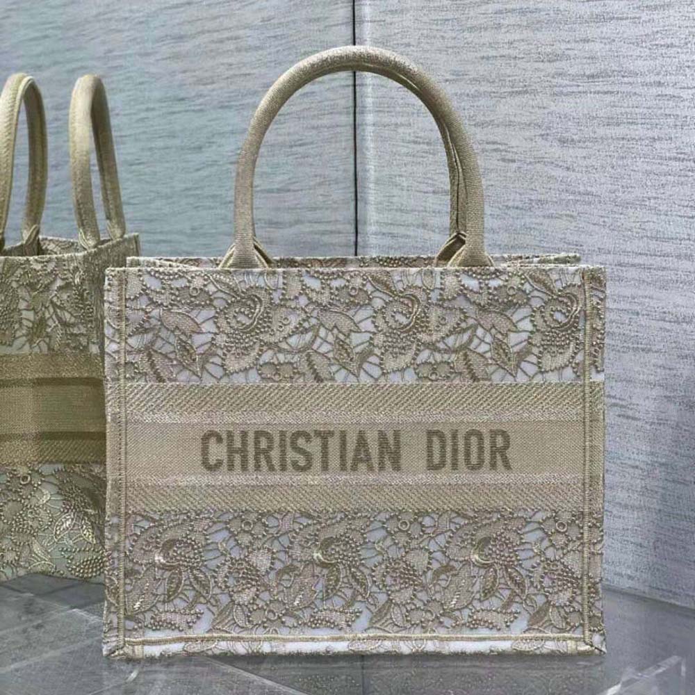 Close-up detail of macramé effect on beige canvas tote by Dior