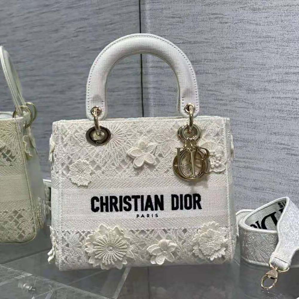 Side angle showing silver-tone closure on Dior Women Medium Lady D-lite Bag