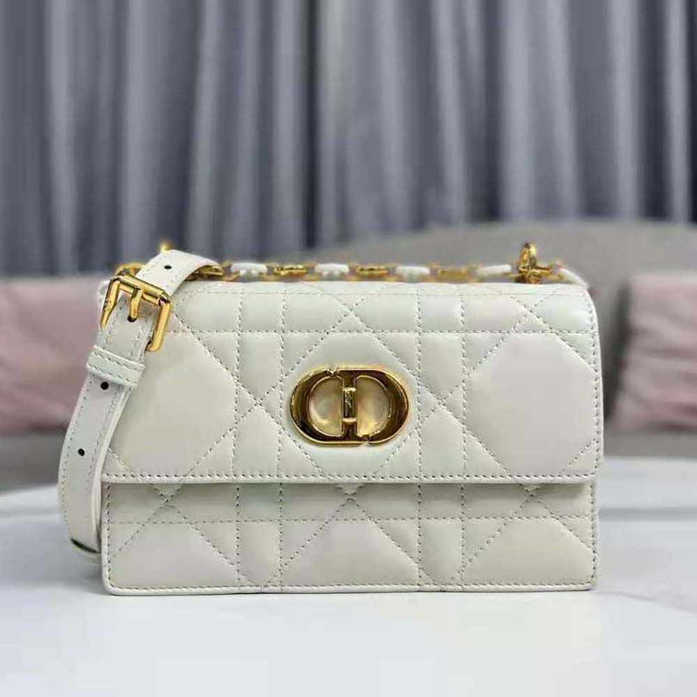 Side angle showing slim profile of Dior Women Miss Caro Mini Bag