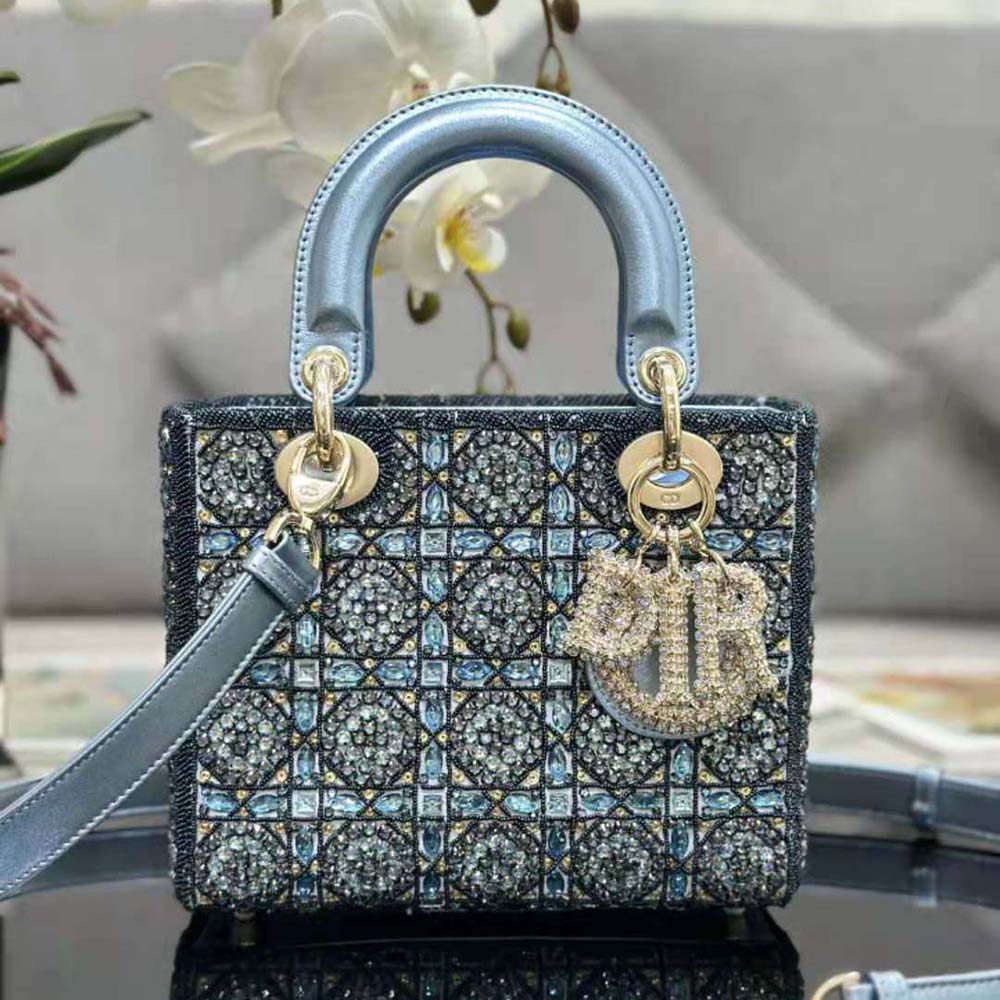 Side angle showing metallic calfskin and satin on Dior Women Small Lady Dior Bag