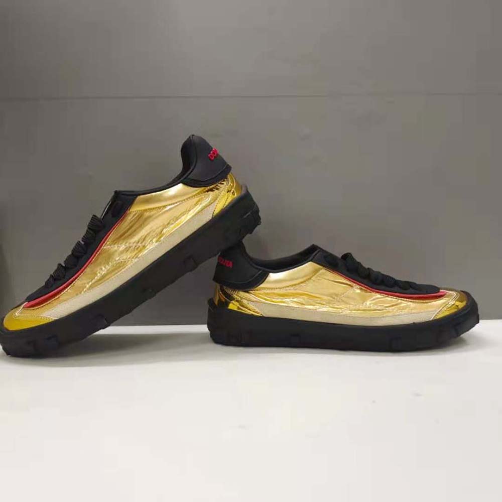 Top angle showing lace closure on Dolce Gabbana Old Runner Sneakers-Gold