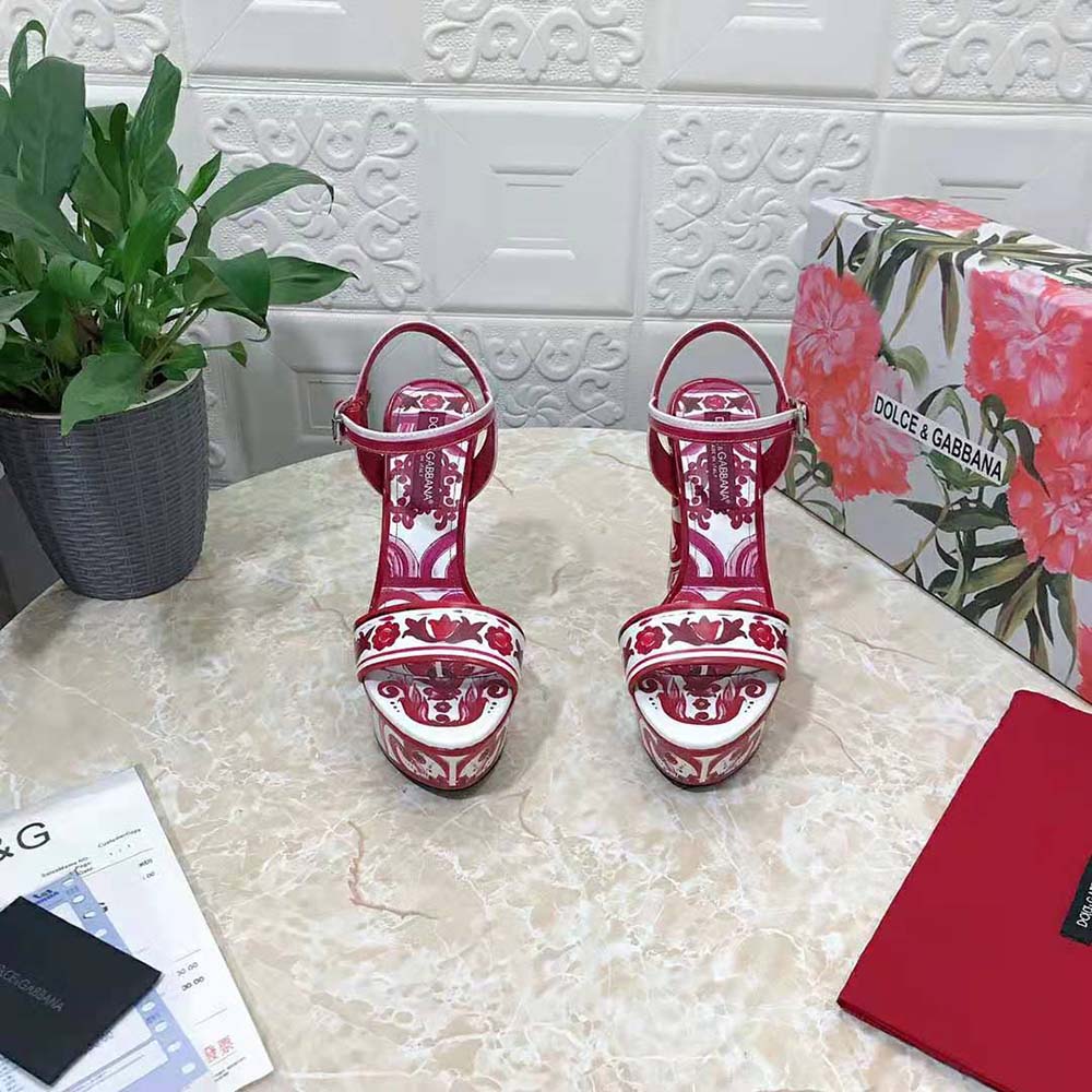 Close-up of heel and signature D&G logo hardware on platform sandals
