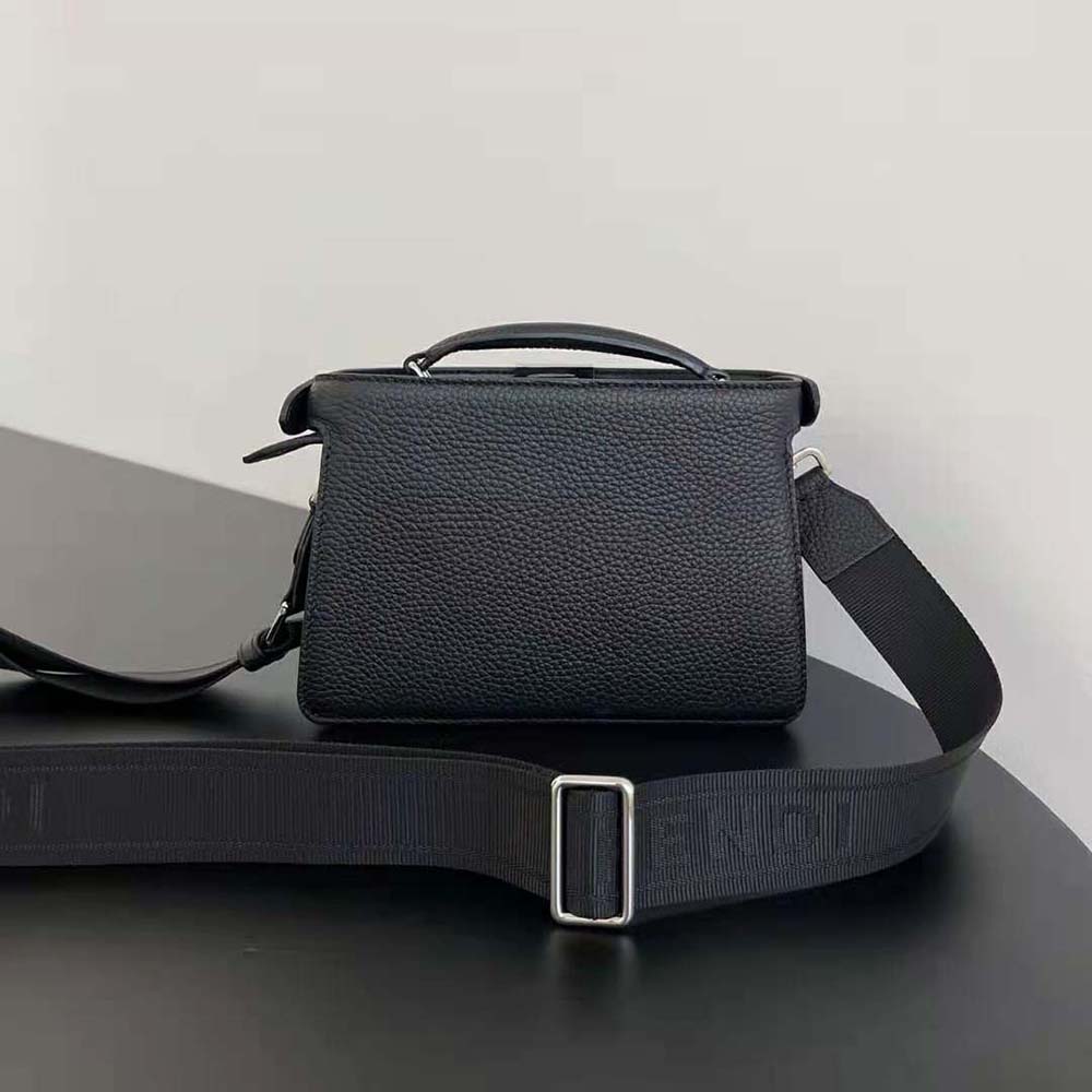 Side profile showing adjustable strap on Fendi Men Peekaboo ISeeU XCross Black Leather Bag