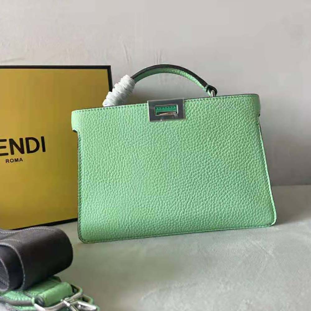 Close-up of gold-tone hardware on Fendi Men Peekaboo ISeeU XCross bag