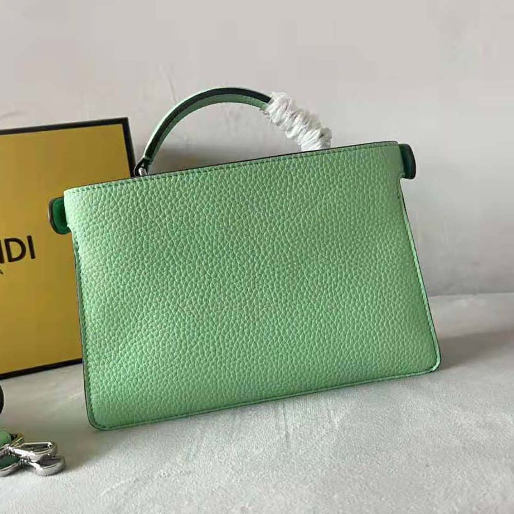 Side angle showing adjustable strap of Fendi Men Peekaboo ISeeU XCross Green Leather Bag