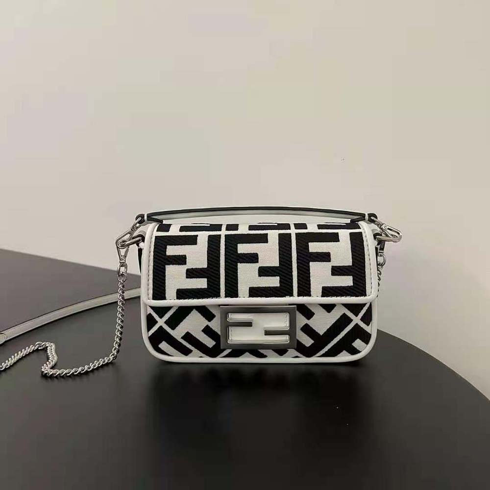 Close-up of FF embroidery and gold hardware on Fendi Women Baguette Mini Bag