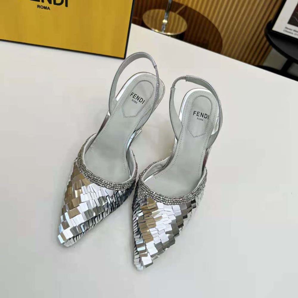 Close-up on silver sequins and buckle of Fendi Women First sandal