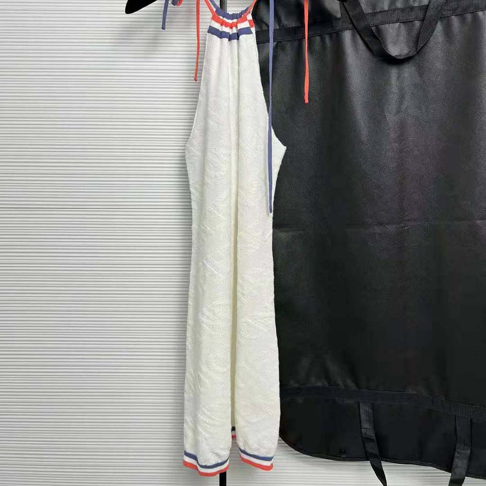 Side angle of Fendi Women White Viscose Dress flowing fabric detail