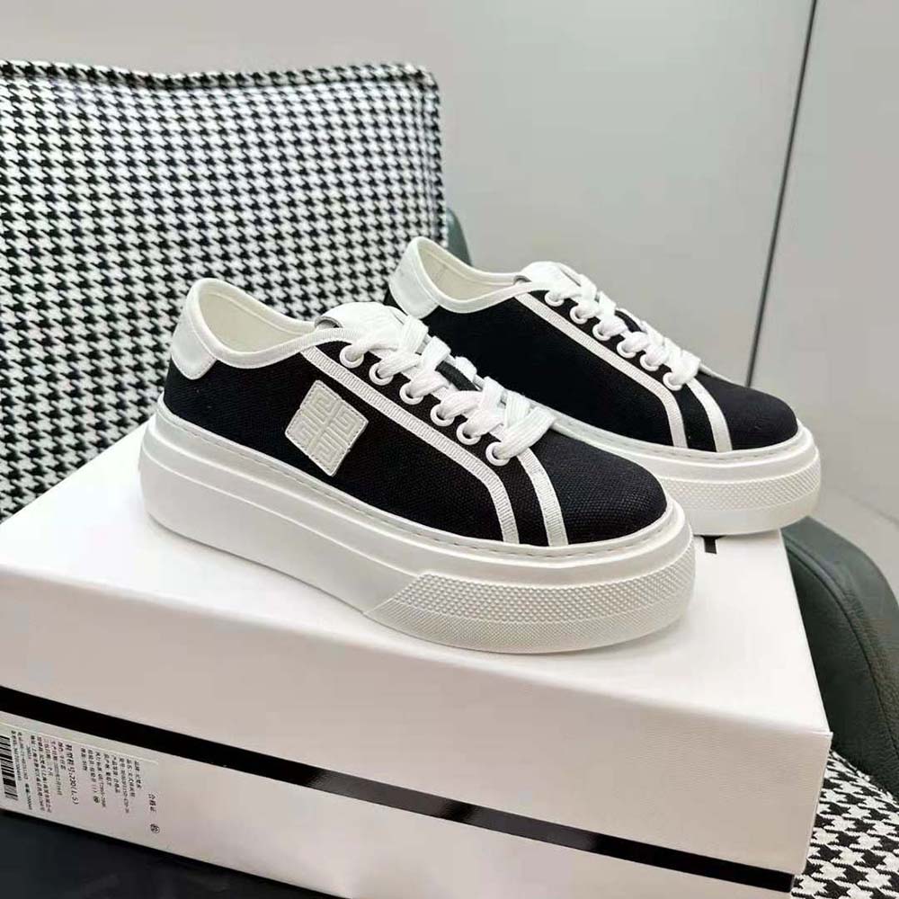 Detail of black canvas and logo hardware on Givenchy Women City Platform Sneakers