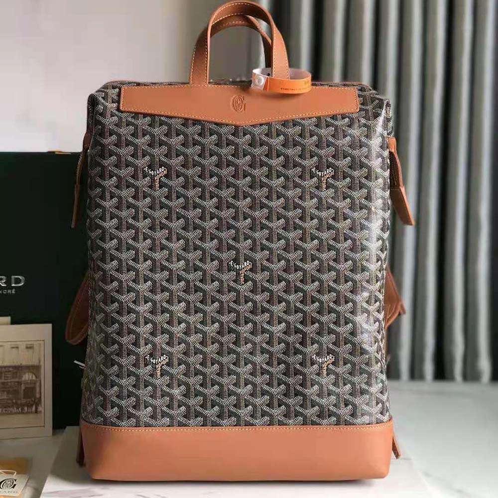Close-up of Goyardine canvas and calfskin leather on backpack