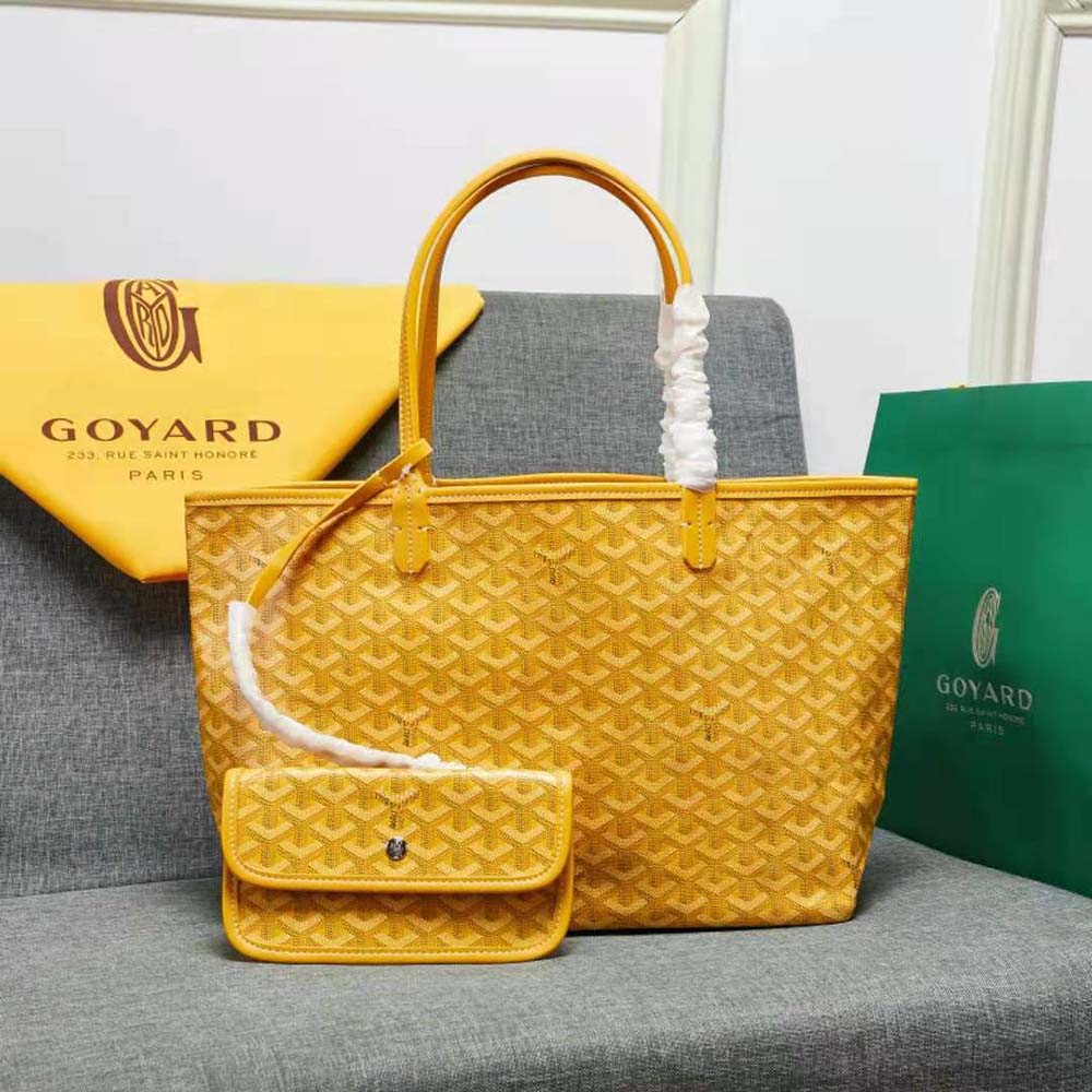 Close-up of yellow calfskin trim and gold hardware on Sac Artois MM