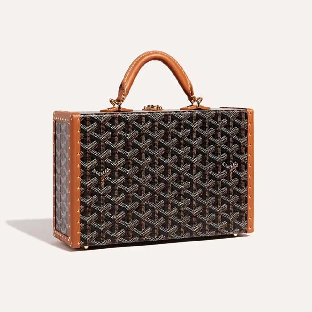 Front angled view of Goyard Women Sac Malle Grand Hôtel in brown canvas and calfskin