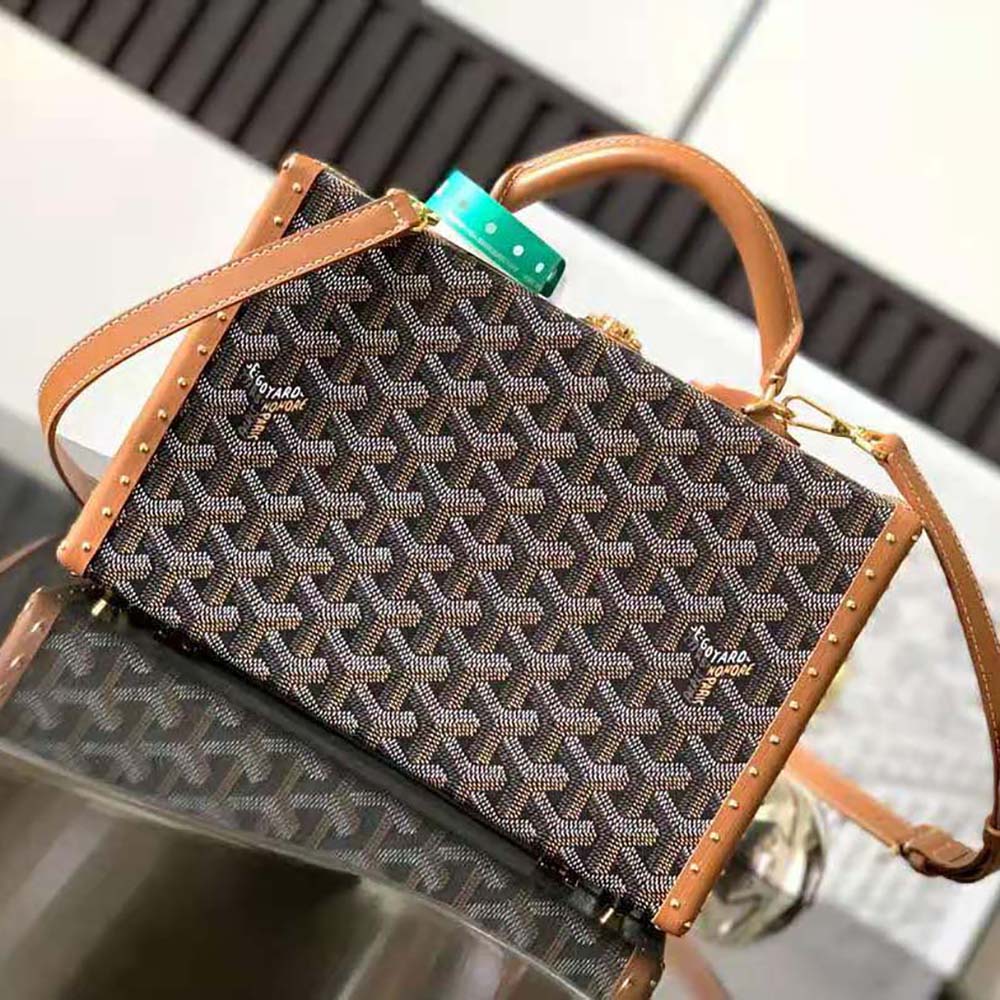 Side profile showing structured silhouette of Goyard Women Sac Malle Grand Hôtel bag