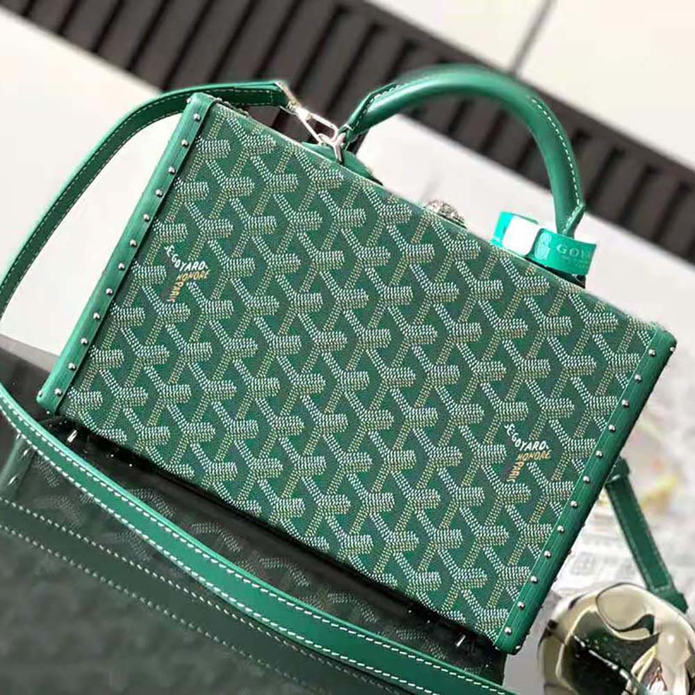Close-up on silver hardware and signature chevron detail of the bag