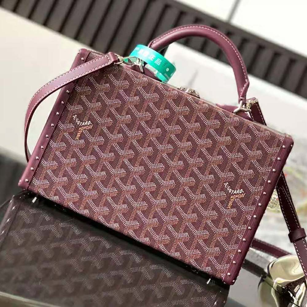 Close-up of gold-tone hardware on Goyard Women Sac Malle Grand Hôtel