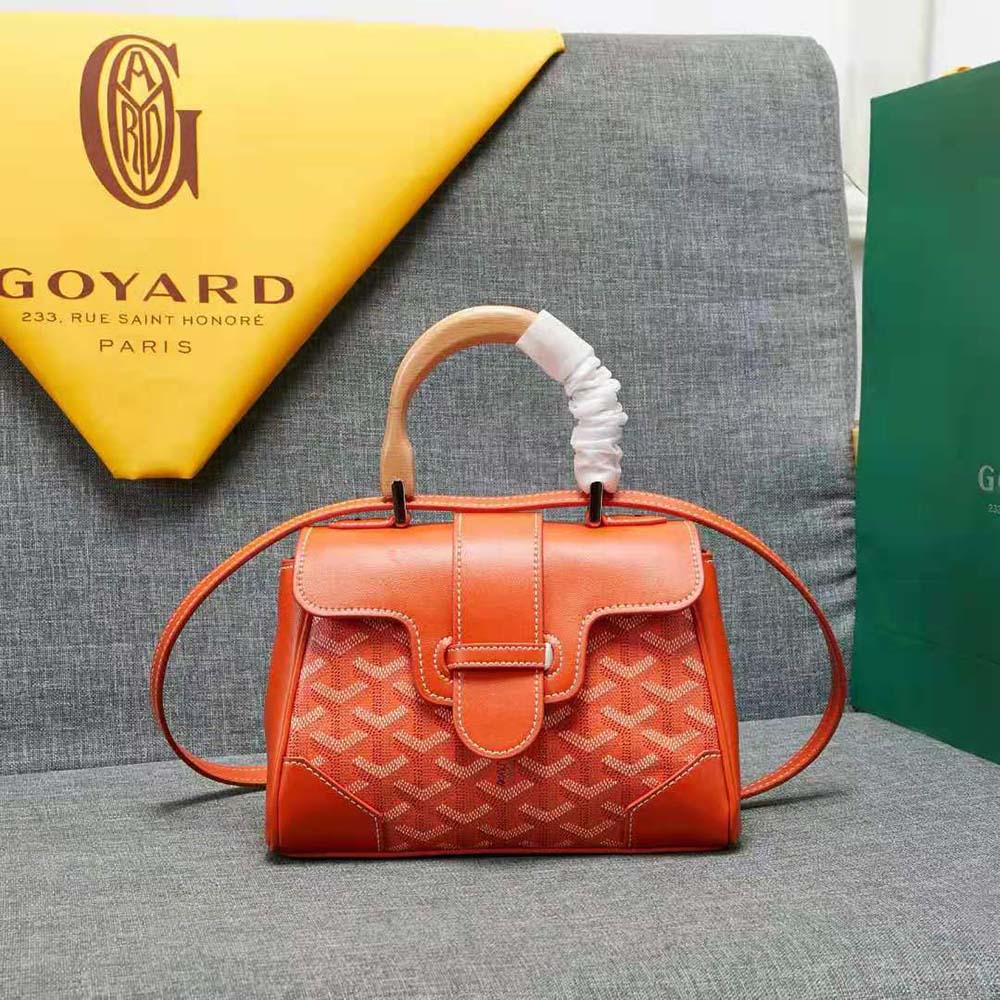 Side angle showing gold-tone hardware on Goyard Women Sac Saïgon Souple Mini