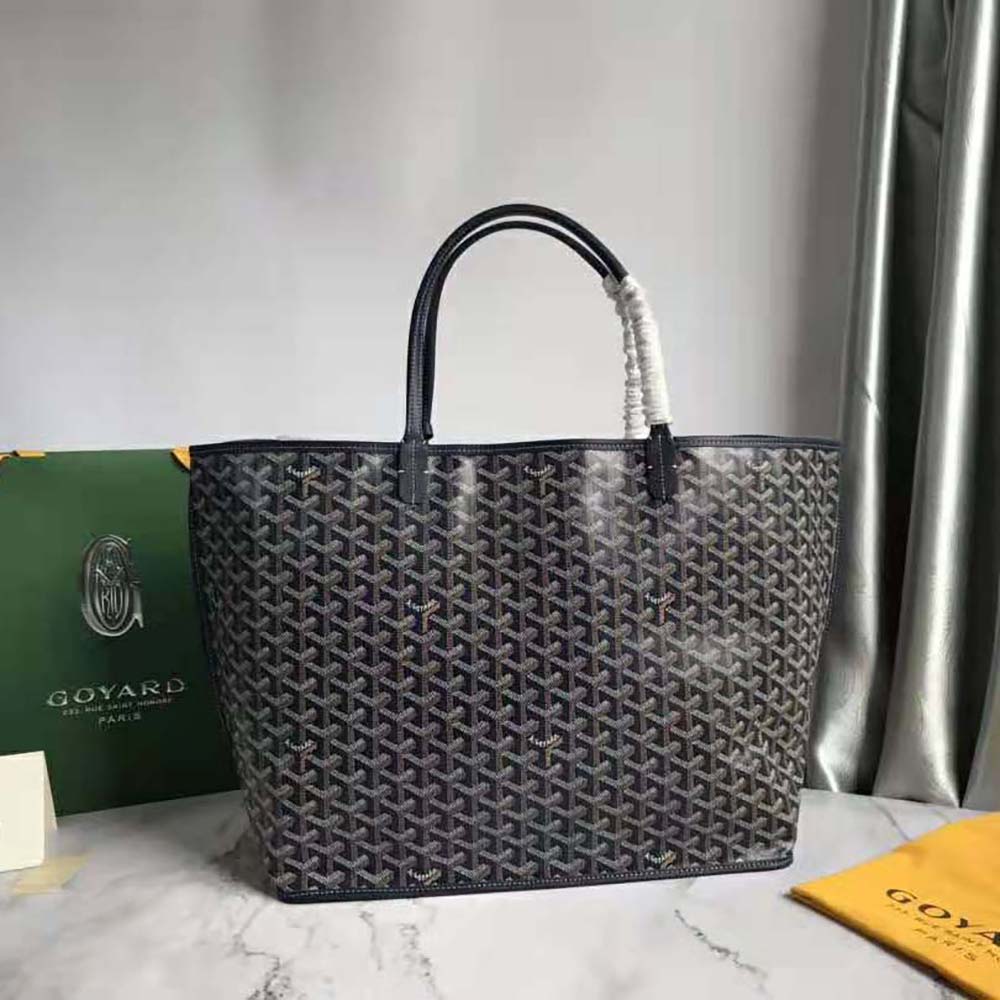 Close-up of Goyardine canvas and calfskin trim on Sac Saint Louis GM