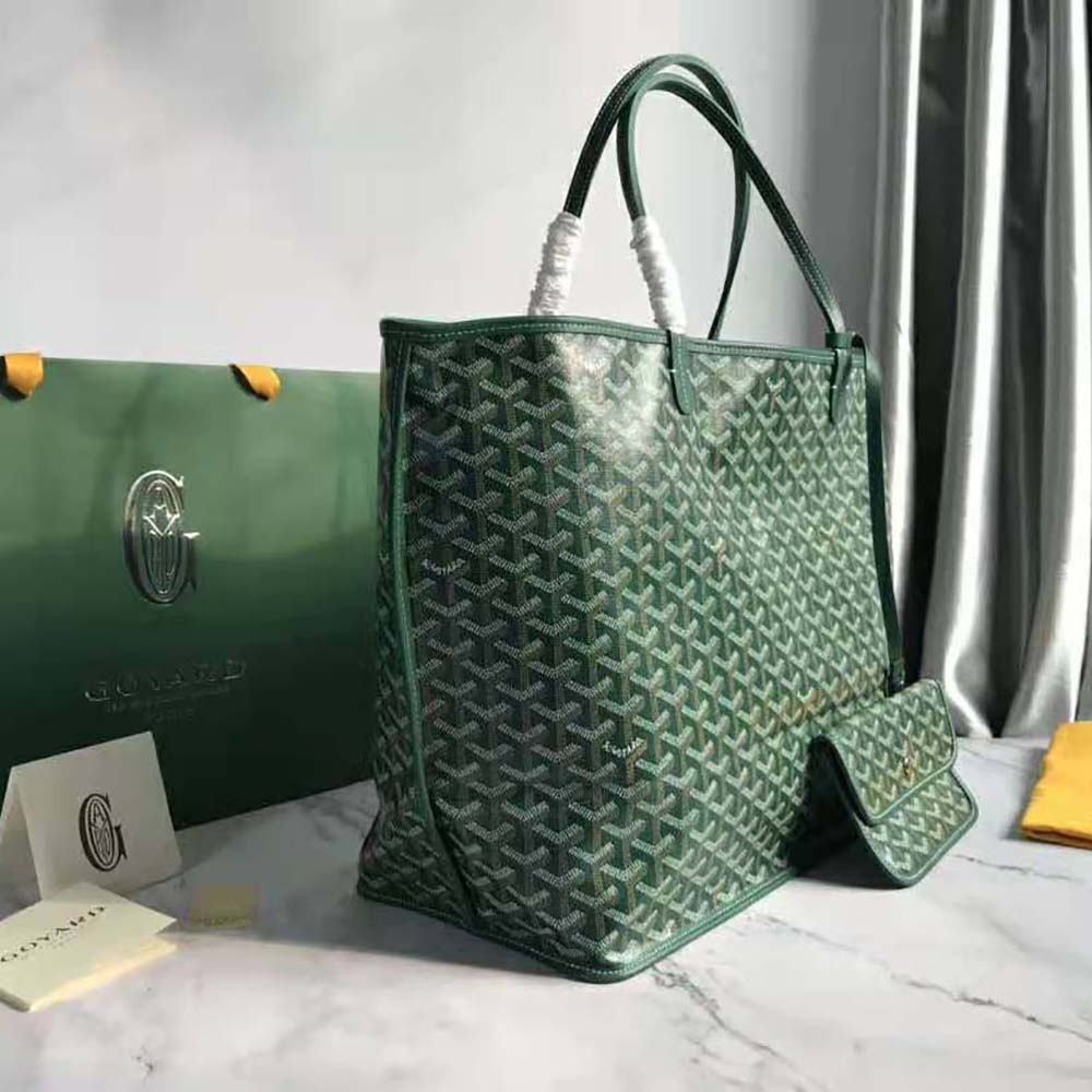 Side profile showing spacious interior and handles of Goyard women’s tote bag