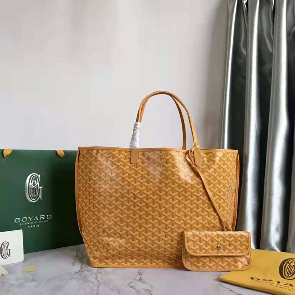 Close-up of Goyardine canvas and yellow calfskin details on Sac Saint Louis GM