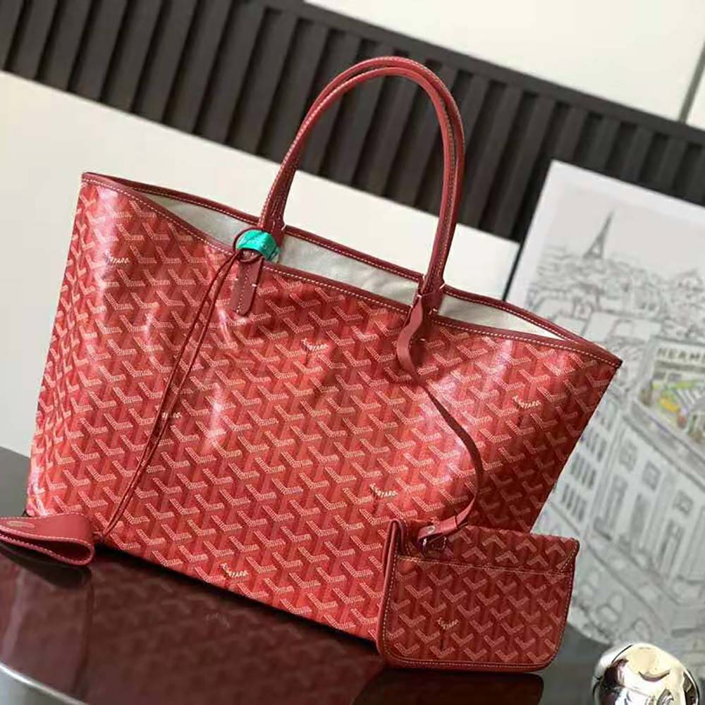 Close-up detail of red chevroches calfskin handle on Goyard Saint Louis PM Bag