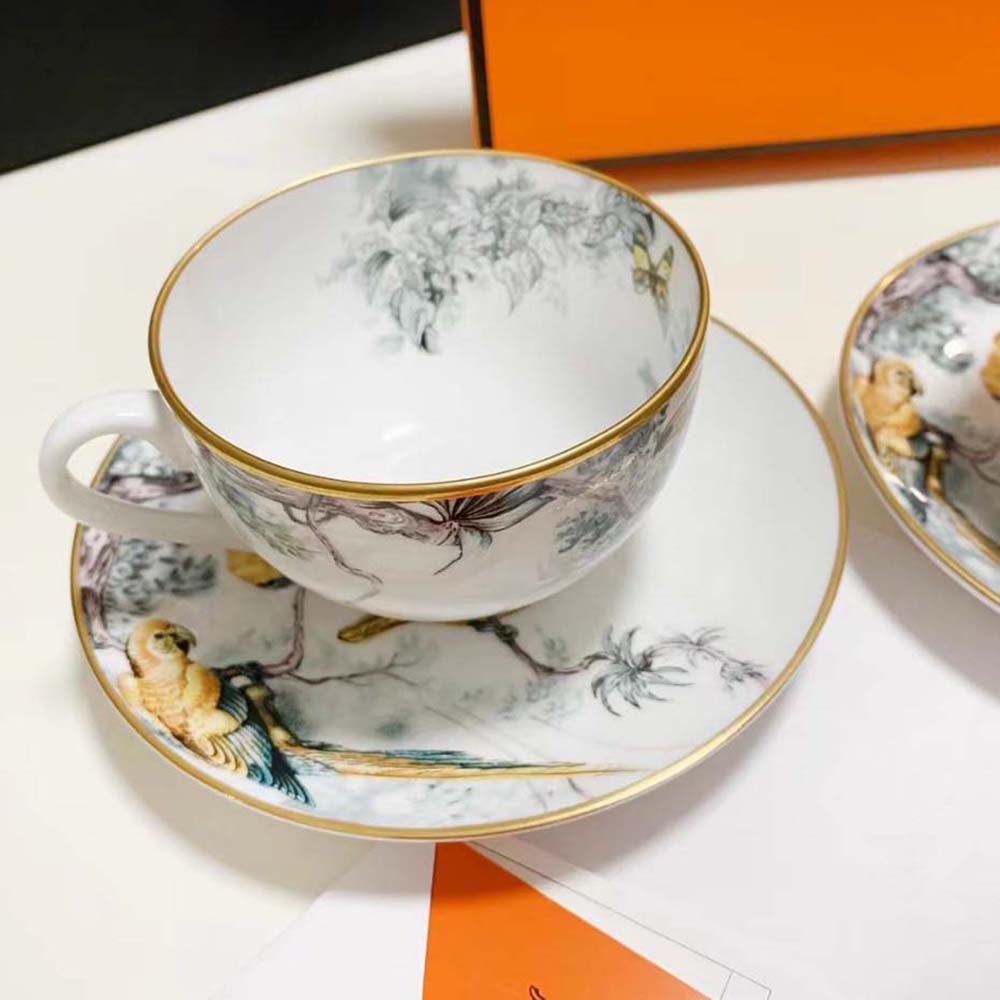 Side profile showing cup handle and saucer of Hermes Unisex Carnets D’Equateur